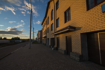 cottage settlement under construction on a summer day