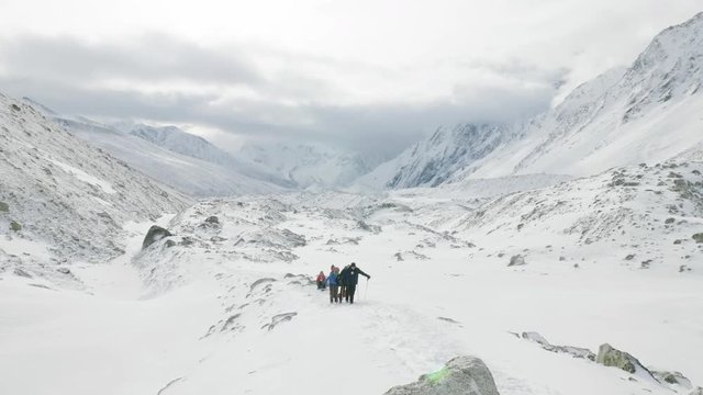 Backpackers on Larke Pass in Nepal, 5100m altitude. Manaslu circuit trek area.