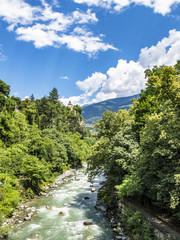 Scenic summer elevated view to Passer River in the spa resort of Merano, South Tyrol, Italy