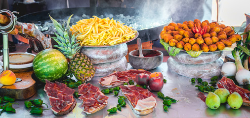 Delicious tasty street food at a market in Spain.