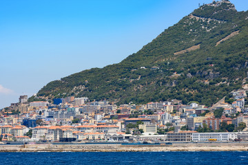 Fototapeta premium Day view to Gibraltar rock from sea, architecture of Gibraltar
