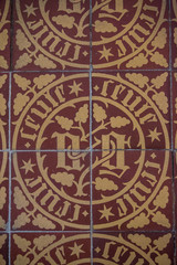 Tile details inside the Hôtel-Dieu de Beaune, a former hospital and alms house in Beaune