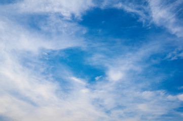 Naklejka na ściany i meble Beautiful blue sky with clouds fleece. Abstract background.