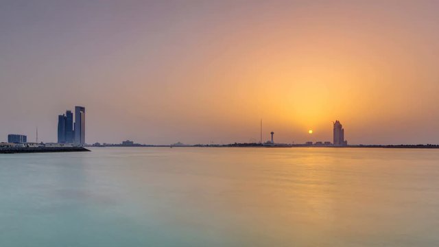 Sunset in Abu Dhabi over Marina Island timelapse
