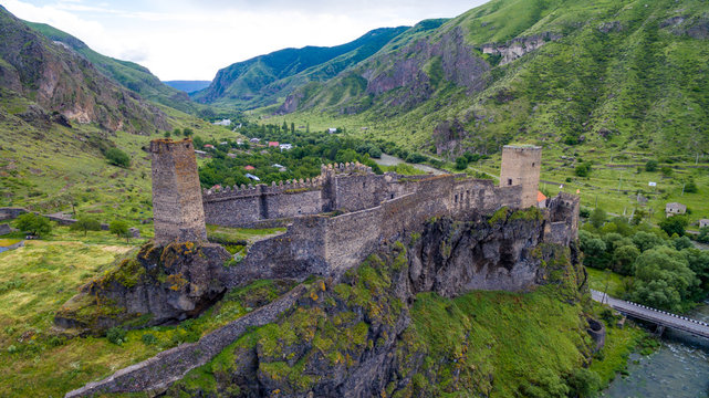 old fortresswith towers on cliff aerial view