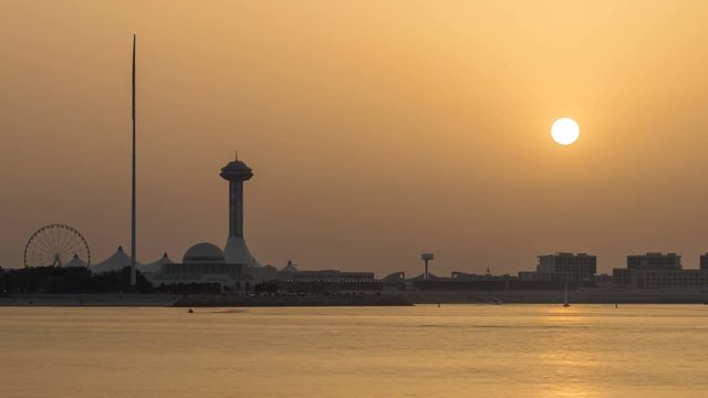 Sunset in Abu Dhabi over Marina Island timelapse