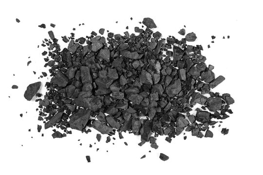 Pile black coal isolated on white background, top view
