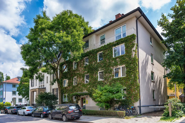 Munich, Germany June 09, 2018: Residential houses in Munich, beautiful residential area, blue sky 