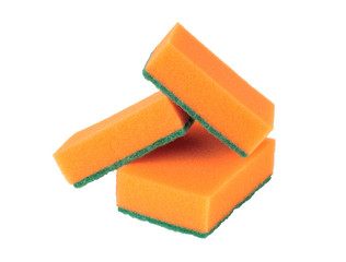 Sponge for washing dishes and rags for a table on a white background