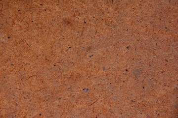 The texture of the plywood. The plywood in the sunlight