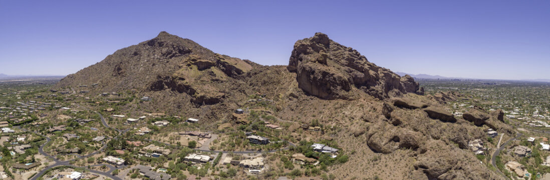 This is a 4 image aerial panoramic of iconic Camelback Mountain in Phoenix, Arizona, USA