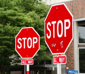 Stop signs at crossroad in Redmon town center