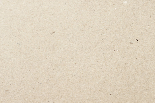 Texture of old organic light cream paper, background for design. Recyclable material, has small inclusions of cellulose