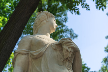 Fototapeta premium Classical sculpture composition a female sculpture the Summer Garden in St. Petersburg
