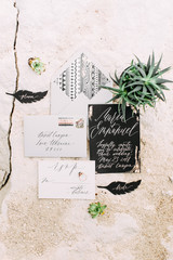 Wedding invitation with succulent. Wedding decor in desrt