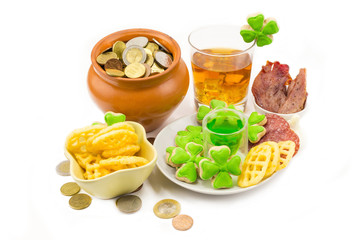 set festive decoration table design symbol holiday day saint patrick brown ceramic pot with coins scotch with clover and plate with snacks meat chips