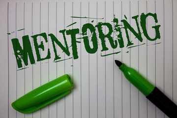 Handwriting text Mentoring. Concept meaning To give advice or support to a younger less experienced person Linned paper background pen cap marker highlighter ink green drawing.