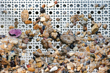 Gemstone panning with a sluice box. Sifting for stones and fossils at the mining sluice. Kids education.