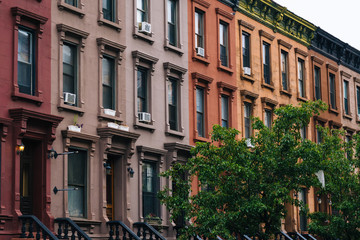 Colorful row houses in Harlem, Manhattan, New York City.