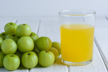 Indian gooseberry on wooden table