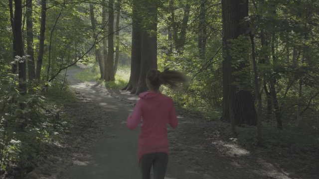 Girl runs through park, color profile Slog3