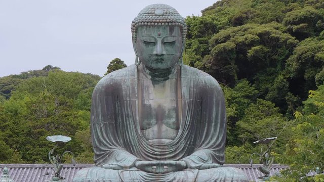 World famous Daibutsu Buddha - the Great Buddha Statue in Kamakura - TOKYO / JAPAN - JUNE 12, 2018