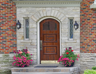 front door of house with flower pot..