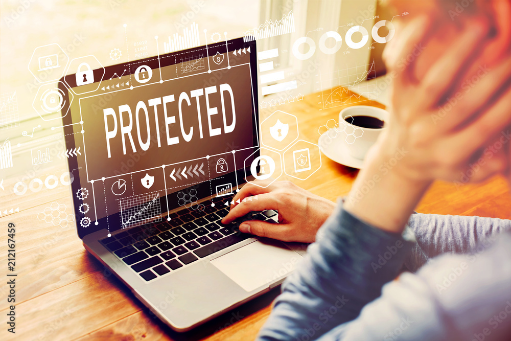 Poster protected with man using a laptop computer