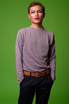 Androgynous young Asian man wearing makeup