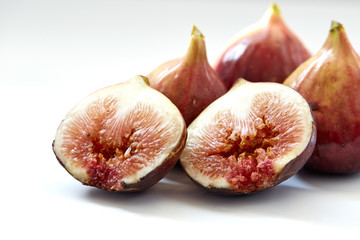 Ripe sweet figs isolated on white