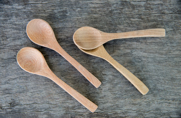 Close up spoon wood on wood table.