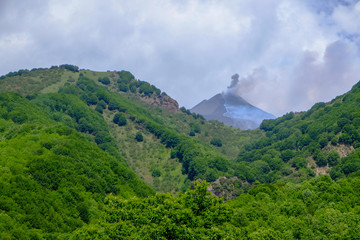 Distant view of Mt Etna during a minor eruption