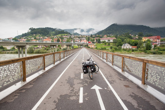 Fototapeta Touring bike on a bridge Dravograd, Slovenia