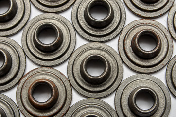 auto repair parts, detail as a background on white