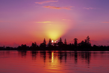 Naklejka premium Magnificent red cloud coastal sunrise vista. Australia.