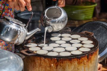 Making of Thai sweetmeat khanomkhrok