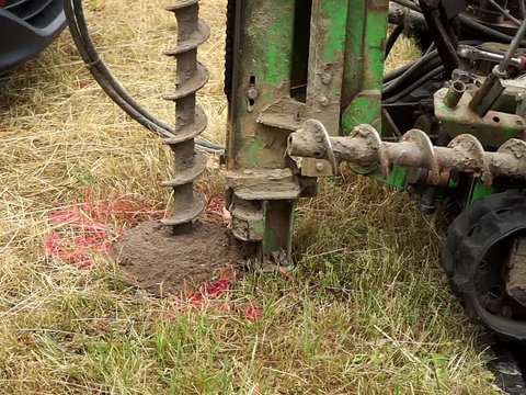 Drilling in loose rock with the auger to establish a measuring point for the groundwater level