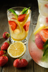 Lemonade with lemon and strawberry, mint and ice