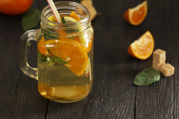Refreshing summer cocktail with crushed ice and citrus fruits