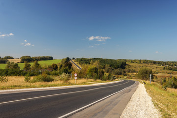 Asphalt road, rural landscape