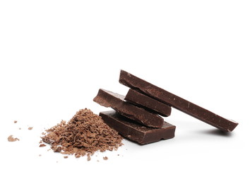 Chocolate bars, pieces with shavings isolated on white background
