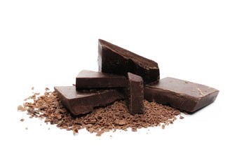 Chocolate bars, pieces with shavings isolated on white background