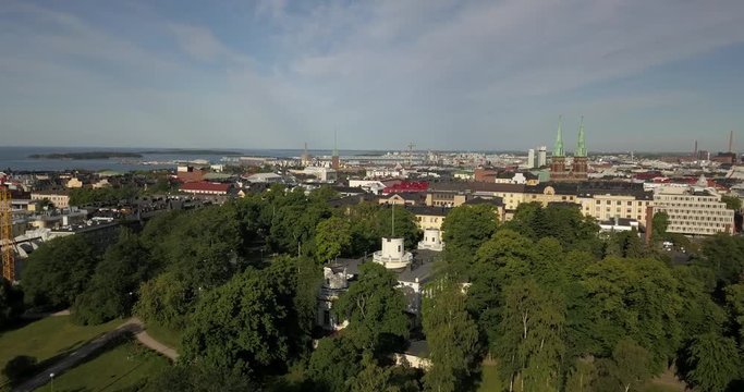4K summer day aerial video of Helsinki Kaivopuisto central park with Observatory, ctyscape view, park woods area around it, in capital of Finland Suomi, northern Europe