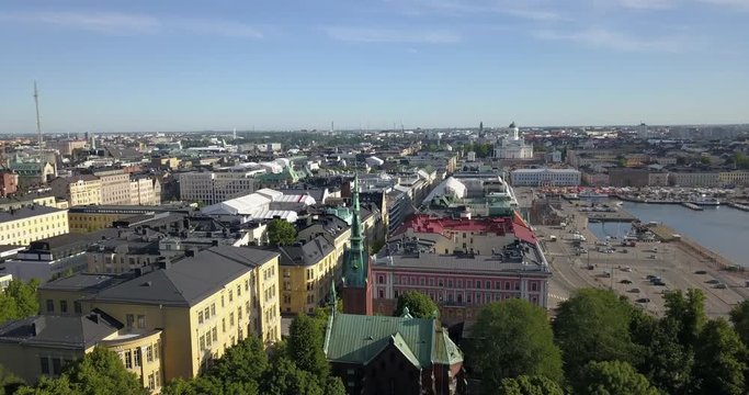 4K summer day aerial video of Helsinki Kaivopuisto central park with Observatory, ctyscape view, park woods area around it, in capital of Finland Suomi, northern Europe