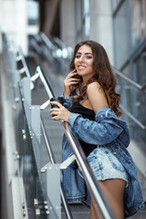 woman with coffee on the street