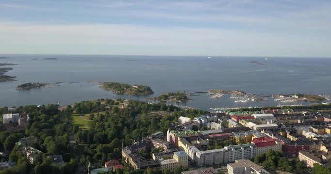 4K summer day aerial video of Helsinki Kaivopuisto central park with Observatory, ctyscape view, park woods area around it, in capital of Finland Suomi, northern Europe