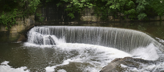 Fototapeta premium Round Falls Semi Circular Man-Made Waterfall in Downtown Baltimore, Maryland USA
