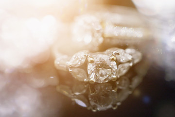 Luxury Jewelry diamond rings with reflection on black background
