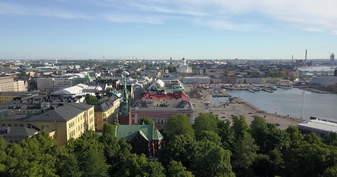 4K summer day aerial video of Helsinki Kaivopuisto central park with Observatory, ctyscape view, park woods area around it, in capital of Finland Suomi, northern Europe