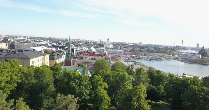 4K summer day aerial video of Helsinki Kaivopuisto central park with Observatory, ctyscape view, park woods area around it, in capital of Finland Suomi, northern Europe